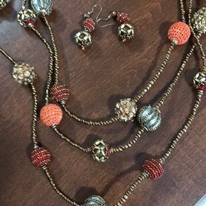 Chico’s long necklace with matching earrings